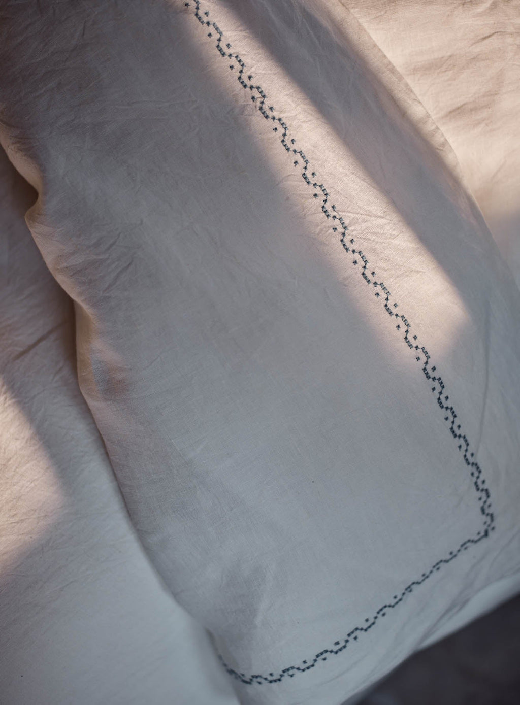 Couette en lin brodé
