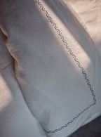 Couette en lin brodé